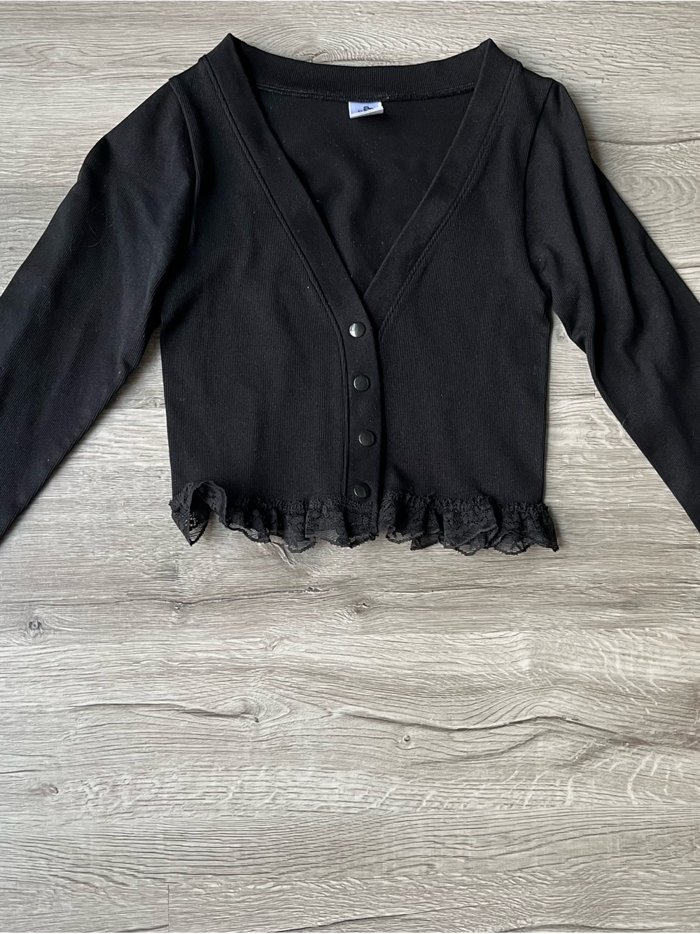 Black Button-Front Sweater with Ruffle Hem